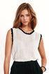 Q2 white knitted pointelle top with black wavy trim