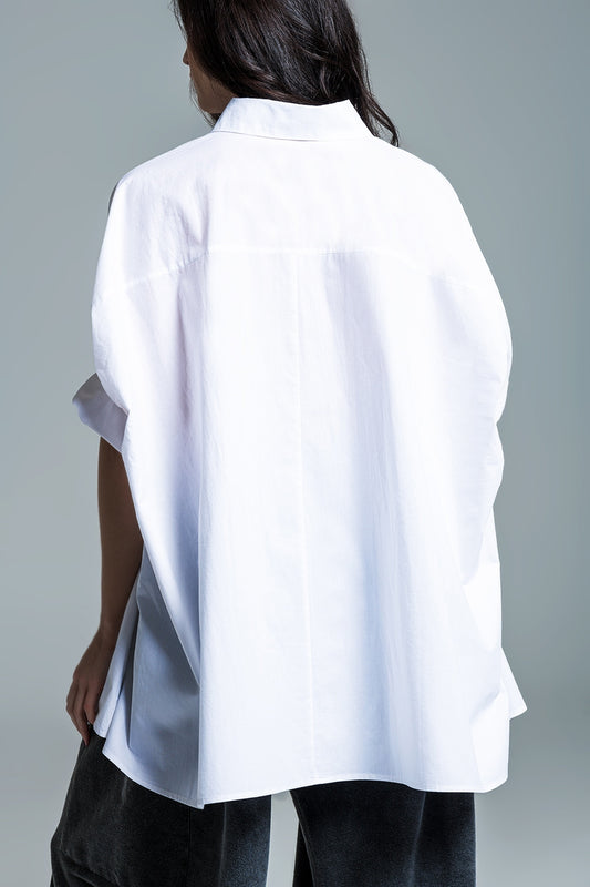 White oversized blouse with short sleeves