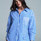 White oversized blouse with vertical stripes in blue and chest pocket