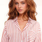 White oversized blouse with vertical stripes in pink and chest pocket