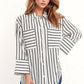 Q2 White shirt with black stripes and chest pockets