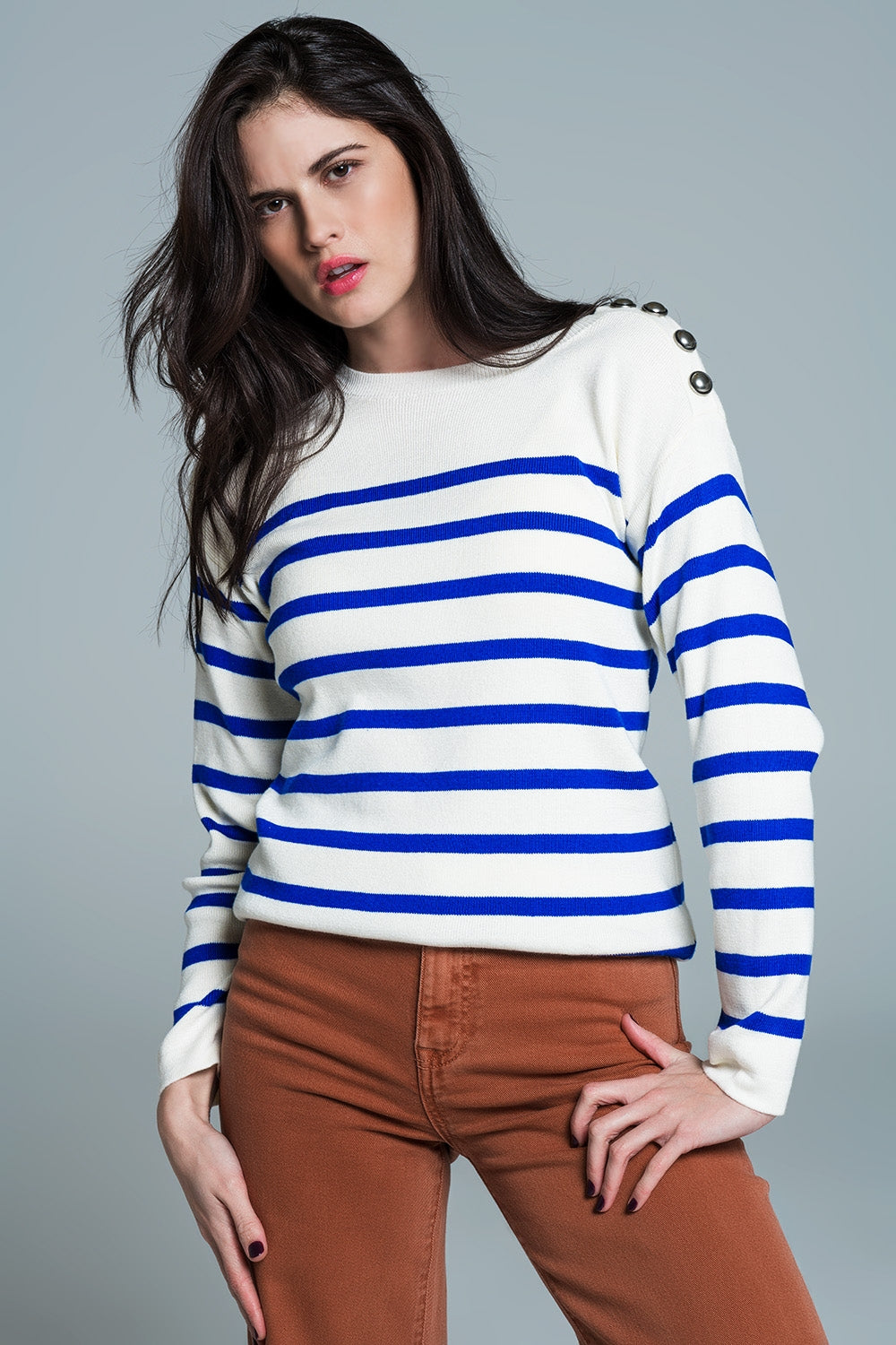 Q2 White sweater with buttons on shoulders and blue stripes