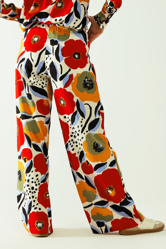 White wide leg pant with poppies designs and lateral pockets