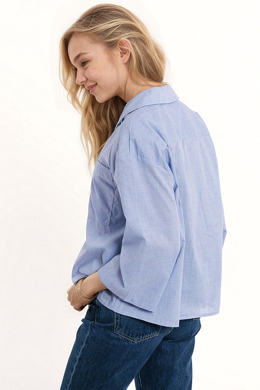 Wide 3/4 sleeves blue shirt with one chest pocket