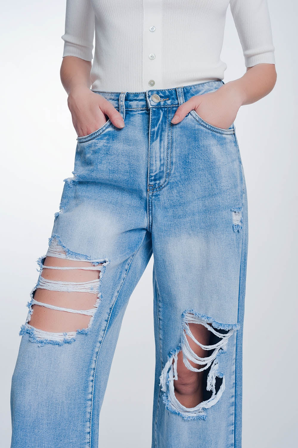 wide leg cropped raw hem jeans in light blue Szua Store