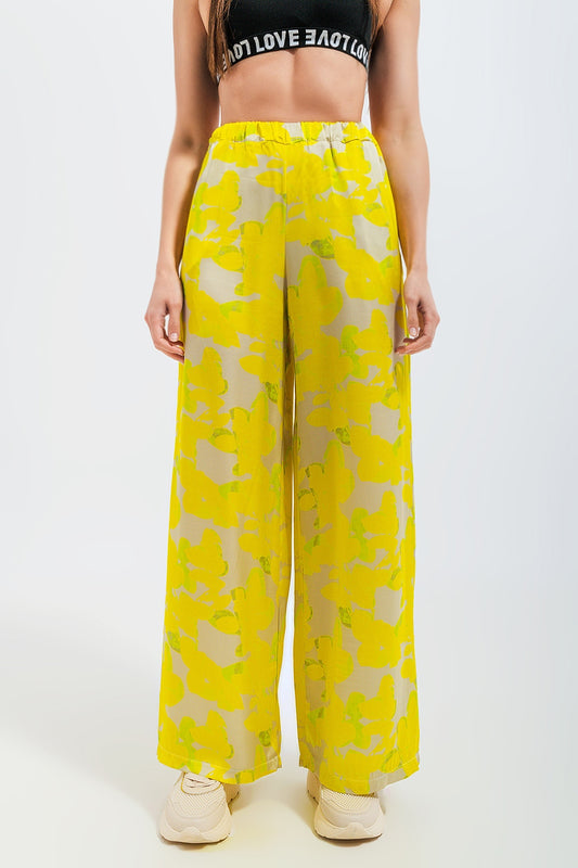 Wide leg trousers in yellow floral Szua Store