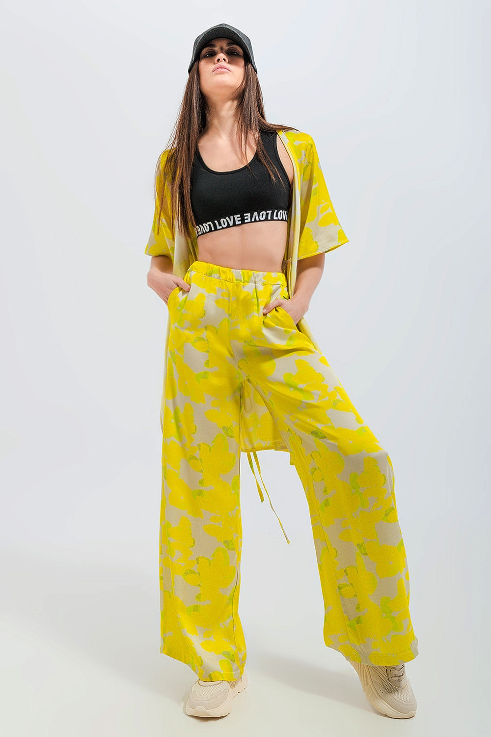 Wide leg trousers in yellow floral Szua Store