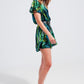 Wrap jumpsuit in green tropical print Szua Store