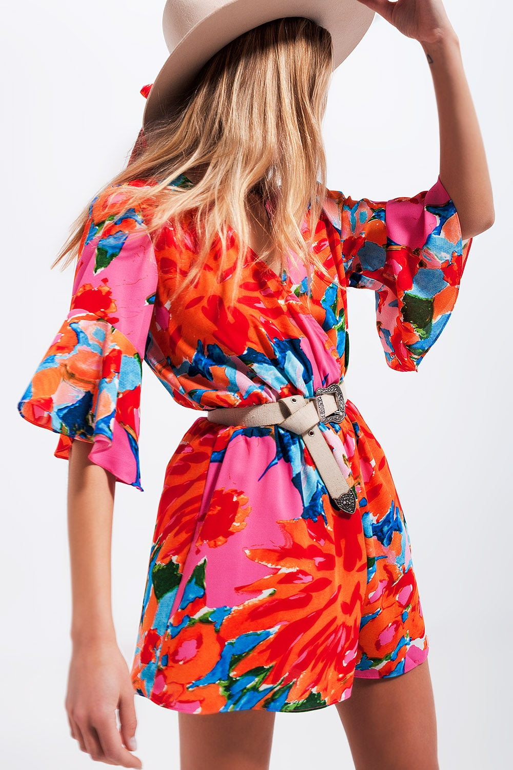 Wrap playsuit in floral Szua Store