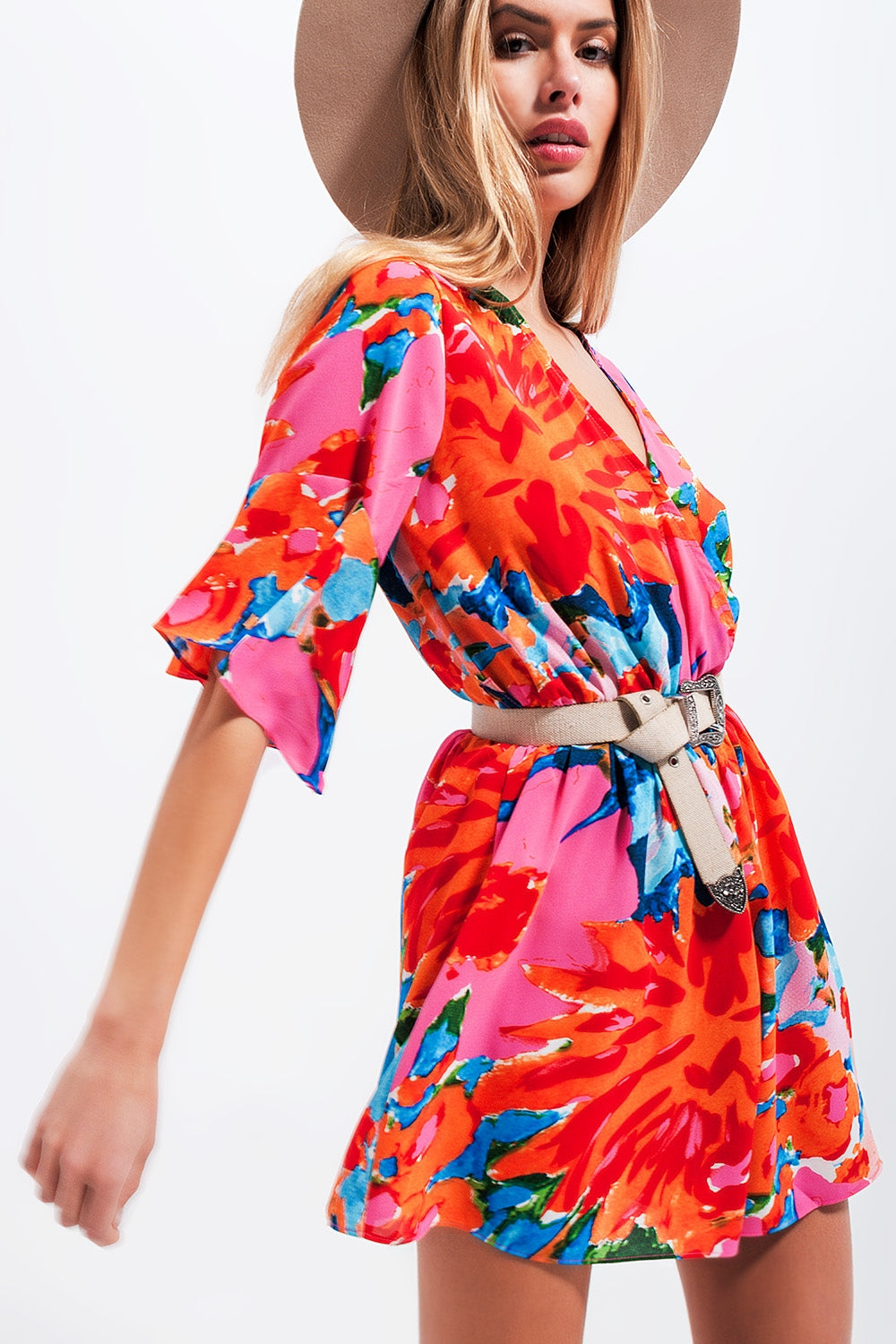 Wrap playsuit in floral Szua Store