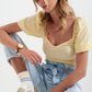 Yellow short top in batiste fabric with puffed sleeves Szua Store